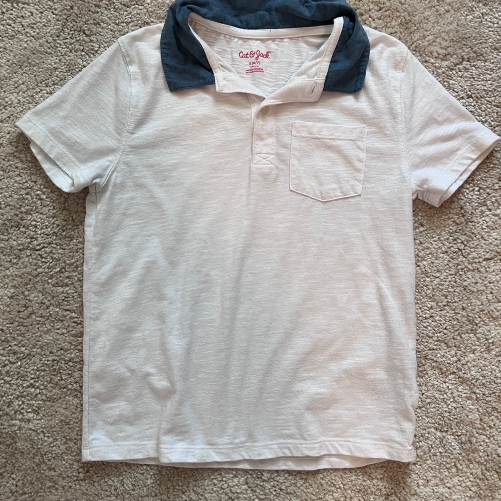 Cat & Jack Boys Size 6-7.  White Polo with Blue Collar and pocket.